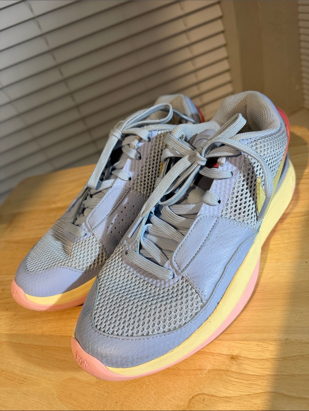 Nike boys Light Blue Mesh Sneakers with Pink and Yellow Accents